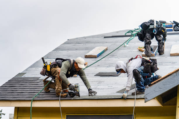Professional Gutter Installation technician working in Artesia, CA